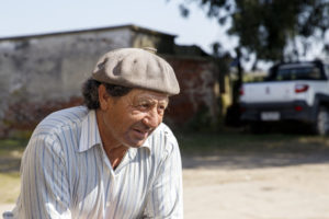 Portrait d'un homme, éleveur, avec un béret en Uruguay.